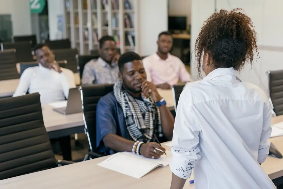 Facilitator leading a working session with a group of participants.